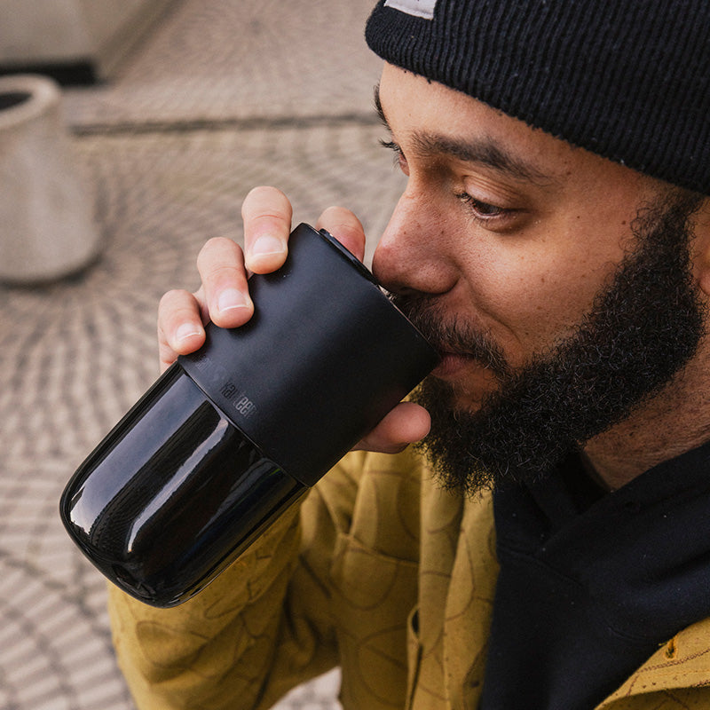 16oz-rise-tumbler-n5 16oz_rise_tumbler_black_man_drink_square.jpg