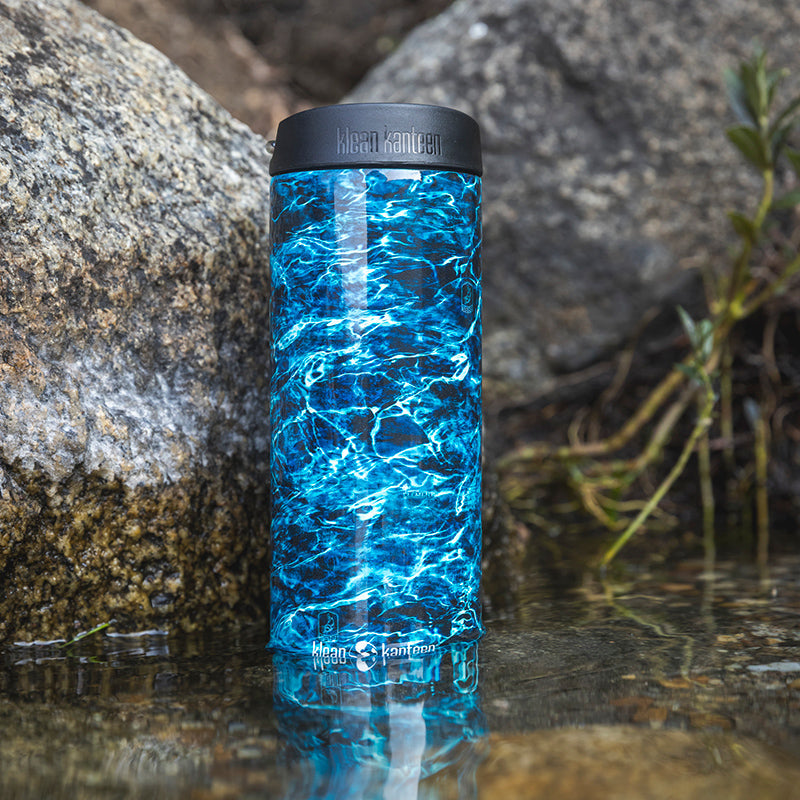 16oz-tkwide-with-cafe-cap-mossy-oak-o0 16oz_tumbler_mossyoak_bass_cafe_water_closeup_square.jpg