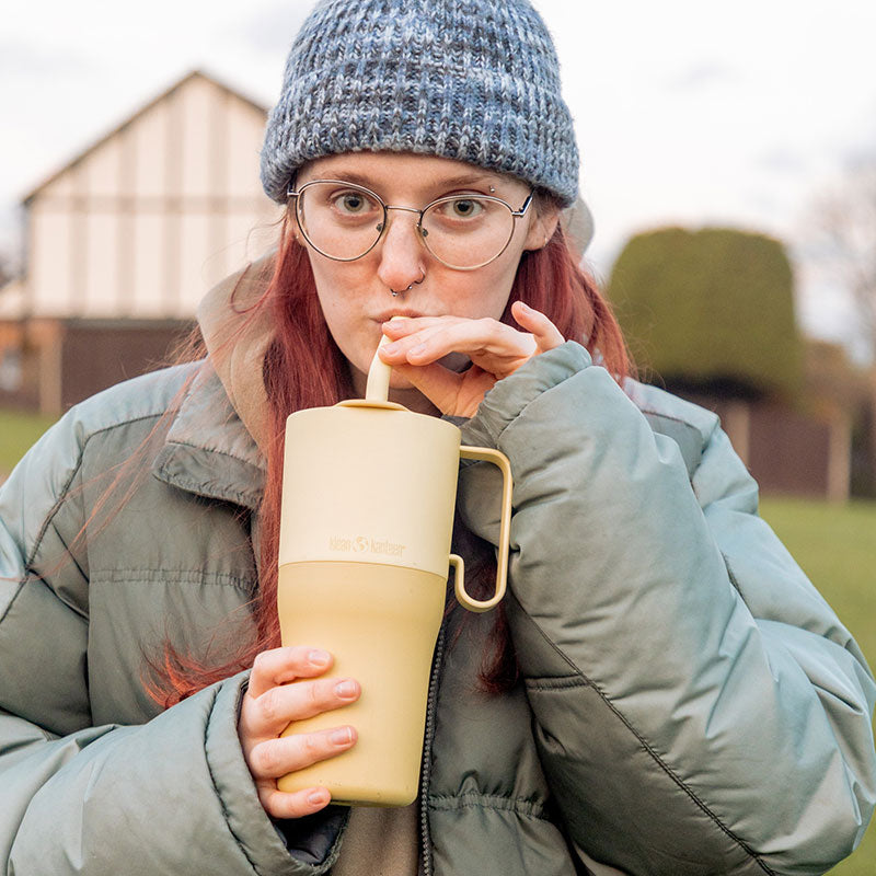 26oz-rise-tumbler-with-straw-lid-s3 26oz_rise_rumbler_straw_wax_yellow_woman_sip_square.jpg