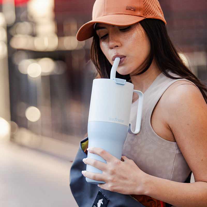36oz-rise-tumbler-with-straw-lid-i5 36oz_rise_tumbler_straw_girl_sip_square.jpg