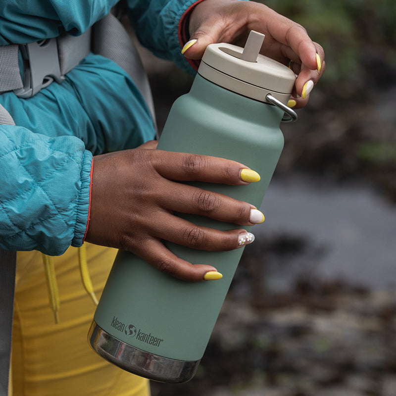 32oz-tkwide-made-to-do-more-bundle-n9 tkwide_32oz_insulated_bottle_twist_closeup_seapsray_hand_square.jpg