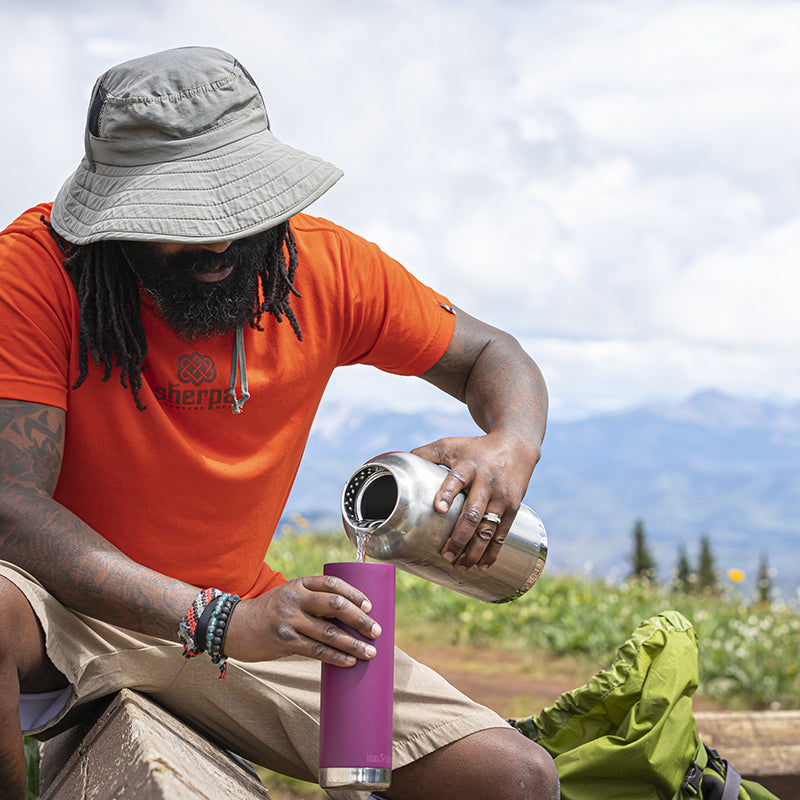64oz-tkwide-with-loop-cap-b4 tkwide_64oz_bottle_backpacker_mountains_filling_square.jpg